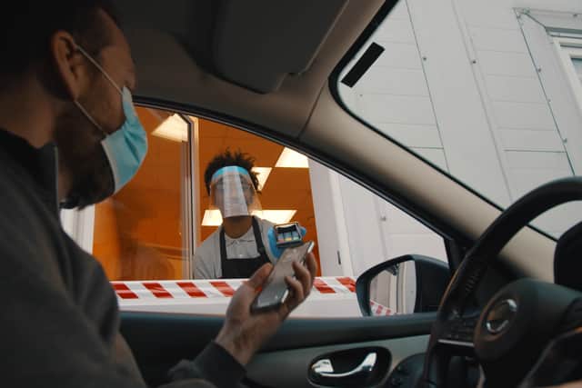 The law changes the rules around using a phone at a drive-through