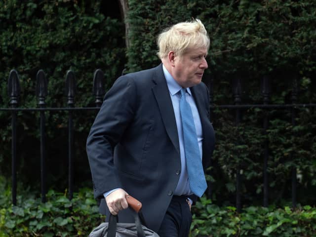 MPs have urged Boris Johnson to pay his own Partygate legal fees