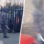 The moment a hooded knifeman casually walked down the street brandishing a huge blade near a Birmingham primary school. Picture:  Birmz Is Grime / SWNS