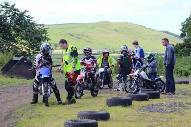 As well as learning to ride the club's members are taught motorcyle maintainance.