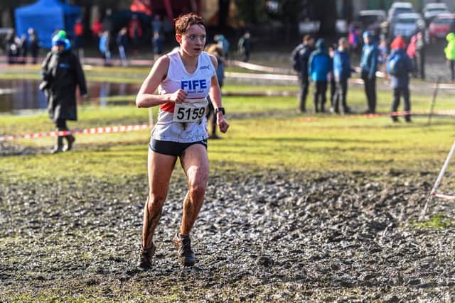 Annabel Simpson battles the mud in in the senior women’s race.