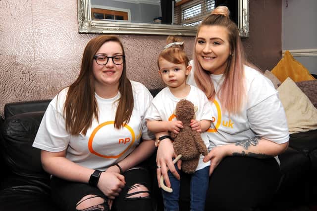 Fundraiser Caitlin Christie with Jordan Hamilton and her little girl Frankie. Pic: Fife Photo Agency