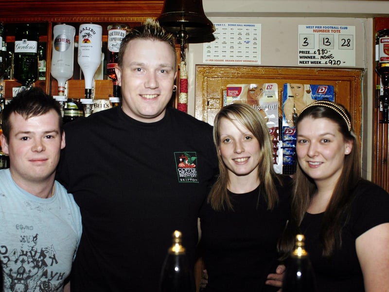 Landlord Danny, second left, with Scholars staff in 2009.