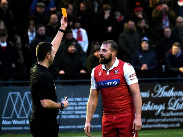 Scarborough Athletic striker Jake Day is booked in the 1-1 draw with Morpeth Town.
Photo by Richard Ponter