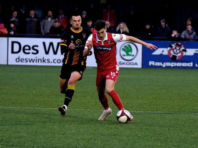 Scarborough Athletic man of the match Luca Colville takes on Morpeth Town.
Photo by Richard Ponter