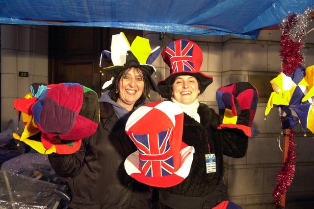 Sue Casper (left) from Chapel Allerton in Leeds and her daughter Oterlie Delvalle selling party hats in Park Row.