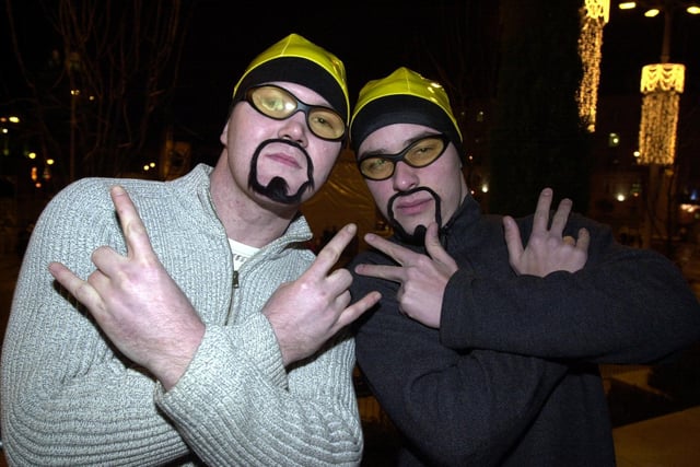 Alex Maitland and Andrew Smith celebrate New Years Eve in Millennium Square, Leeds dressed as Ali G on December 31, 2002.