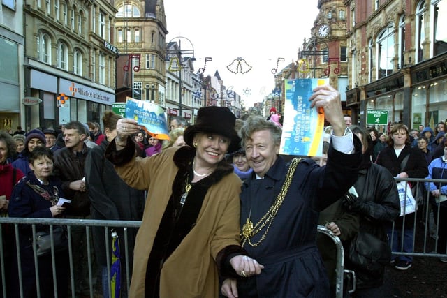 Coronation street legend and Lady Mayoress Liz Dawn and the then Lord Mayor of Leeds Coun Bernard Atha handing out tickets for the New Year's Eve 2001 party in the Millennium Square.