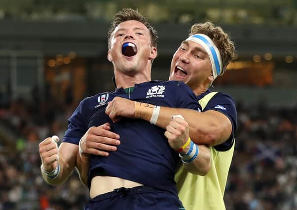 FUKUROI, JAPAN - OCTOBER 09: George Horne of Scotland celebrates scoring his team's seventh try with Jamie Ritchie of Scotland during the Rugby World Cup 2019 Group A game between Scotland and Russia at Shizuoka Stadium Ecopa on October 09, 2019 in Fukuroi, Shizuoka, Japan. (Photo by Mike Hewitt/Getty Images)