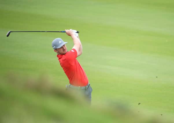 Connor Syme plays his second shot on the third hole during day two of the Oman Open. Pic Warren Little/Getty