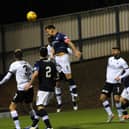 Kyle Benedictus goes close with a header against Falkirk on Tuesday night (Pics by Walter Neilson)