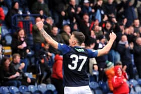 Dan Armstrong celebrates his opening goal for Raith Rovers in the 2-1 win over Forfar. Pic: Walter Neilson