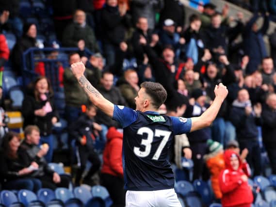 Dan Armstrong celebrates his opening goal for Raith Rovers in the 2-1 win over Forfar. Pic: Walter Neilson