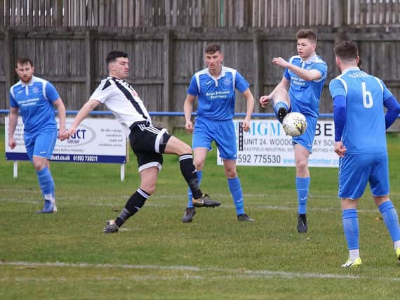 Action from Dundonald's defeat to Dunbar at Moorside Park on Saturday. Pic: George Wallace