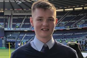Kirkcaldy Rugby Club youngster Murray Oliver received his Mitsubishi Young Volunteer of the Year award at the Six Nations match against France at Murrayfield. Pic: Kirkcaldy Rugby