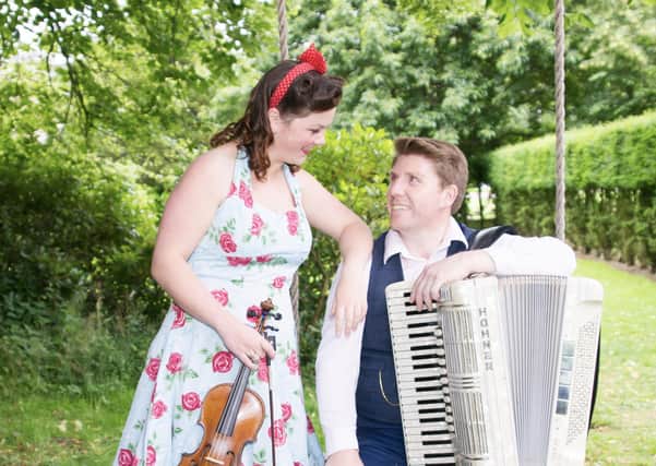 Alan Small and Gemma Donald from the Lomond Ceilidh Band. Image copyright: Lisa Barrie Photography