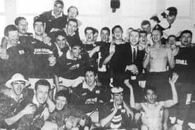 Raith Rovers players celebrate after the club won promotion to the Scottish Premier Division in 1993.