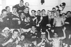 Raith Rovers players celebrate after the club won promotion to the Scottish Premier Division for the very first time.