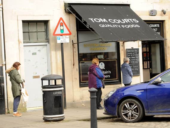 Social distancing queue at Tom Courts butchers in Burntisland. Pic: Fife Photo Agency.