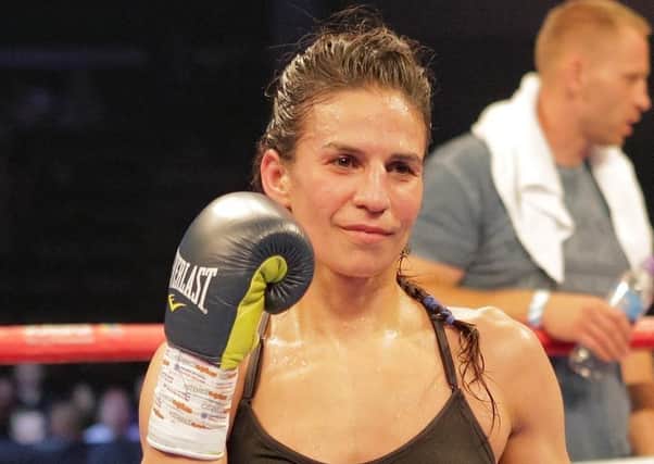 Eftychia Kathopouli wins her first professional Super Featherweight fight by defeating Domenika Novotna on points over four times two minute rounds (picture: Gordon Bell)