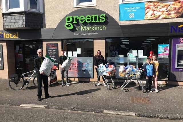 Kids Melissa and David Williamson donated their Links Market Money to help which was doubled by Green’s in Markinch.