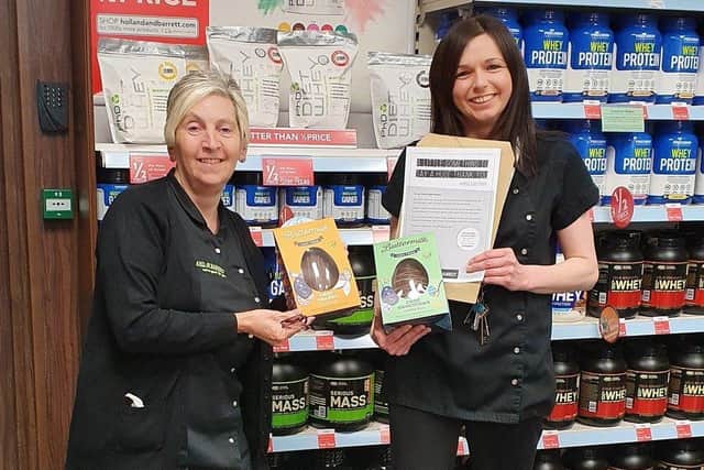 Holland and Barrett staff from the Kirkcaldy High Street store donate items to the Cottage Family Centre