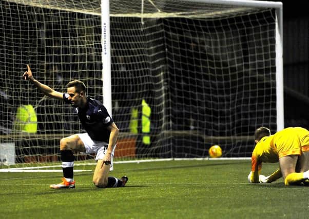 Steven MacLean scores against Falkirk - will he be in contention for goal of the season? (Pic: Fife Photo Agency)