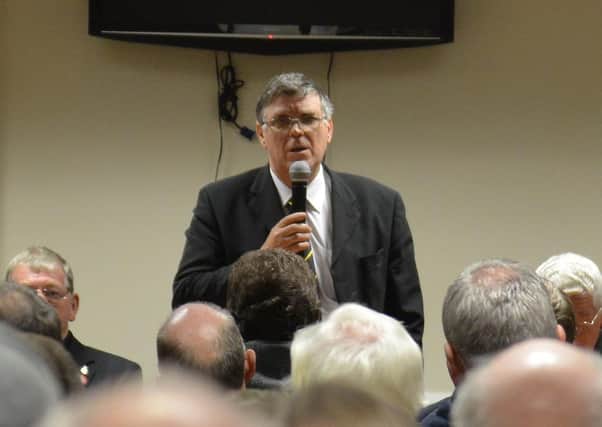 Jim Stevenson speaks to fans during Monday night's meeting.