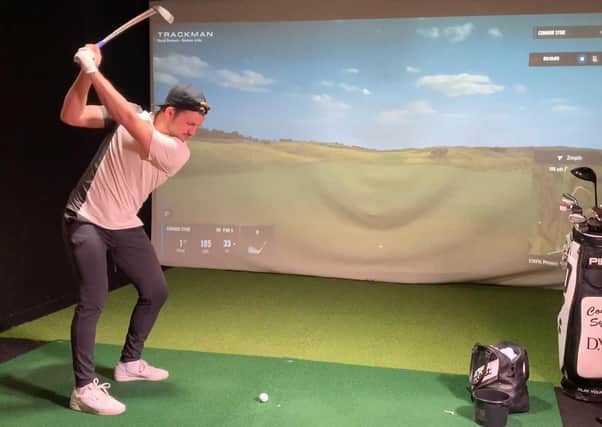 Connor Syme on his way to victory in the second BMW Indoor Invitational powered by TrackMan