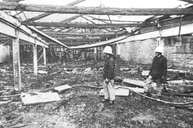 A fire crew survey the aftermath of the blaze at Kirkcaldy Alma Bowl in July 1990.