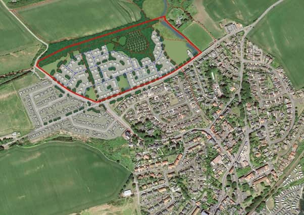 The area, highlighted in red, where the proposed houses would go.