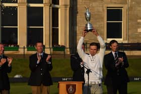 Zach Johnson  holds the Claret Jug after winning the 144th Open Championship at The Old Course in St Andrews.  (Photo by Stuart Franklin/Getty Images)