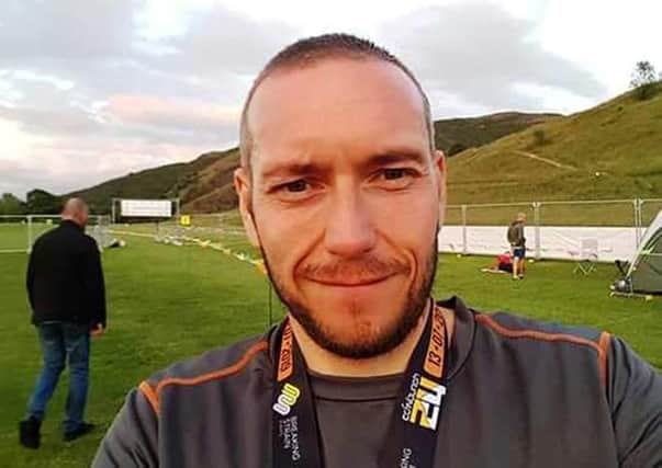 Jim Paterson after completing the Edinburgh Half Marathon last year.