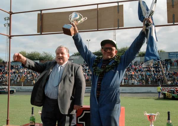 Ernie Burgoyne wins the Saloon World Championship in 1991.