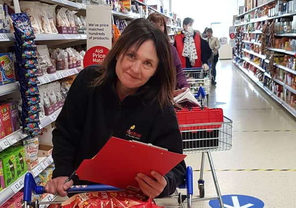 Volunteers are matched with older people who need help getting their weekly groceries.