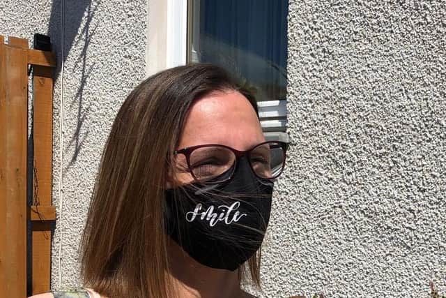 Kirkcaldy bridal designer Mirka wearing one of the new face masks she is now producing.