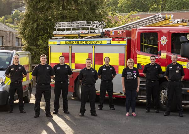 Tracey Groom, Kindness Project Lead at CHSS, and the Kilsyth Fire & Rescue team showing their support for the partnership.