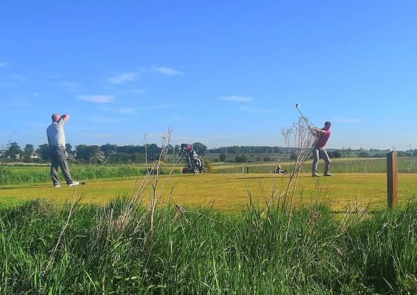 Golfers enjoy getting back on to the fairways at Elmwood Golf Course