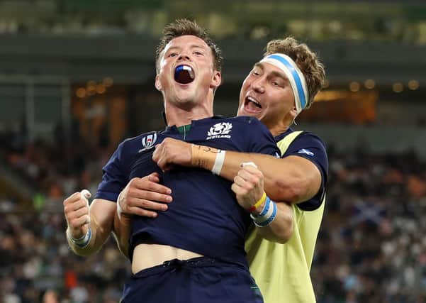 Jamie Ricthie celebrates with former Howe of Fife team mate George Horne at the 2019 World Cup. (Photo by Mike Hewitt/Getty Images)