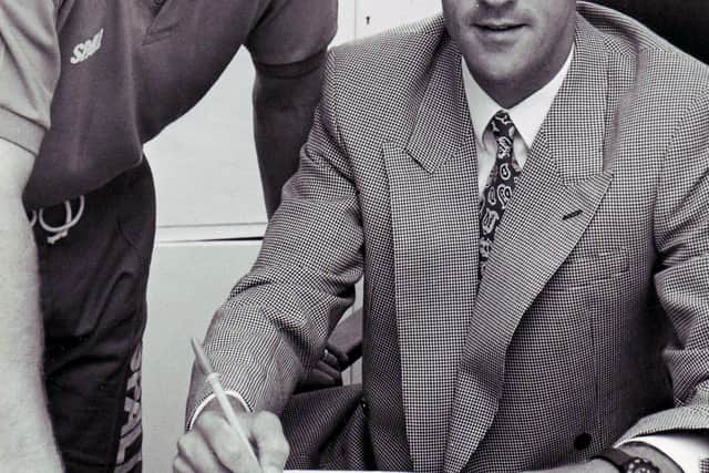Craig Brewster signs for Raith Rovers in 1991 with manager Jimmy Nicholl