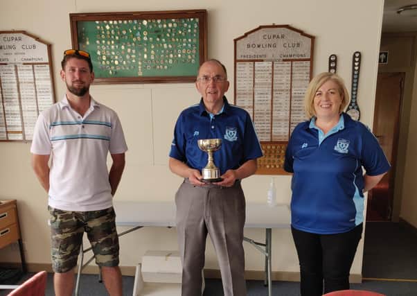 Willie McLeod, John Bowers and Lynne Christie were presented with the trophy by the club president, Nikkii Cormack.