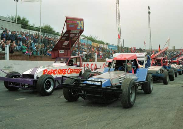 The cars on the grid at the start of the BriSCA Formula II World Championship Final 1990 at Cowdenbeath Racewall.