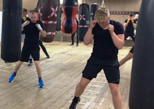 Kingdom Boxing Club members return to training.