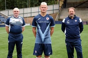 New Raith Rovers signing, 16-year-old Luke Mahady  with manager John McGlynn and Paul Smith (assistant).