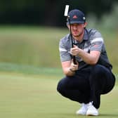 Connor Syme  lines up a birdie on the 10th green during the first round of the Austrian Open at Diamond Country Club on July 09, 2020 in Atzenbrugg, Austria. (Photo by Stuart Franklin/Getty Images)