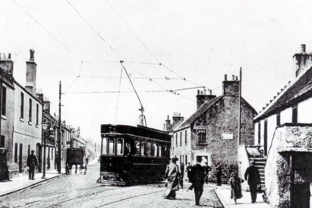 A tram is pictured on Kirkcaldy's Rosslyn Street in Gallatown. The Kirkcaldy Corporation Tramways service first started in 1906.
