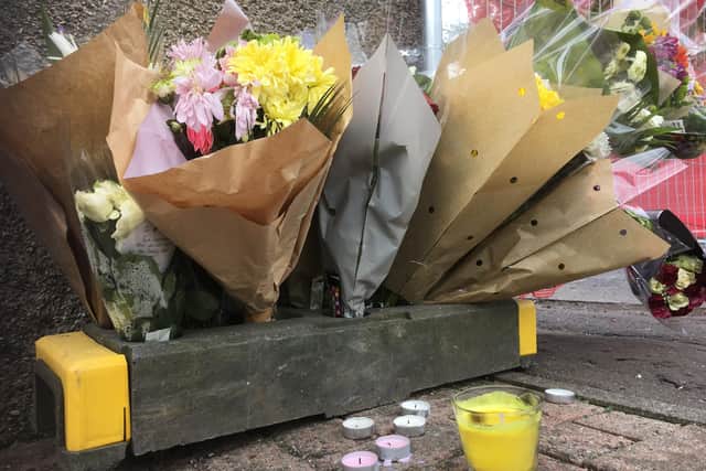 People have left cards and flowers. Picture: George McLuskie.