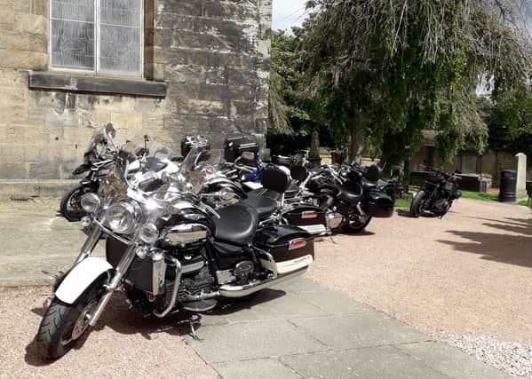 Kirkcaldy Old Kirk's 15th Century tower had a roaring 21st century experience last weekend when half a dozen RMA-Riders arrived at its foot for a short break in Kirk Wynd.