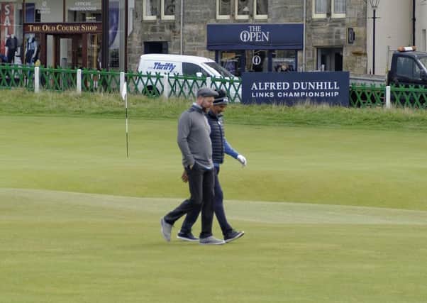 Brian McFadden, of Westlife fame, walks up the first fairway of the Old Course during the 2018 Alfred Dunhill Links Championship.
