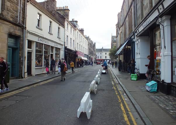 Barriers are still in place on some town centre streets.